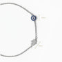 Pulsera en plata ley 925 con símbolos de ojo turco y mano de fátima decorada con circones.