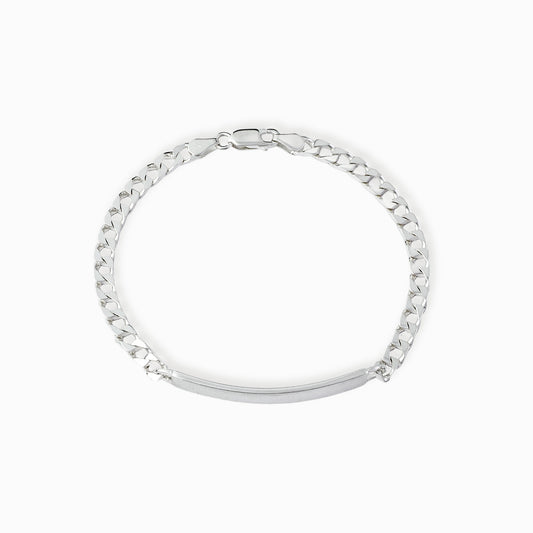 Pulsera de cadena con placa central lisa de 4.5 cm para grabado, elaborada en plata ley 925 con acabado brillante sobre fondo blanco.
