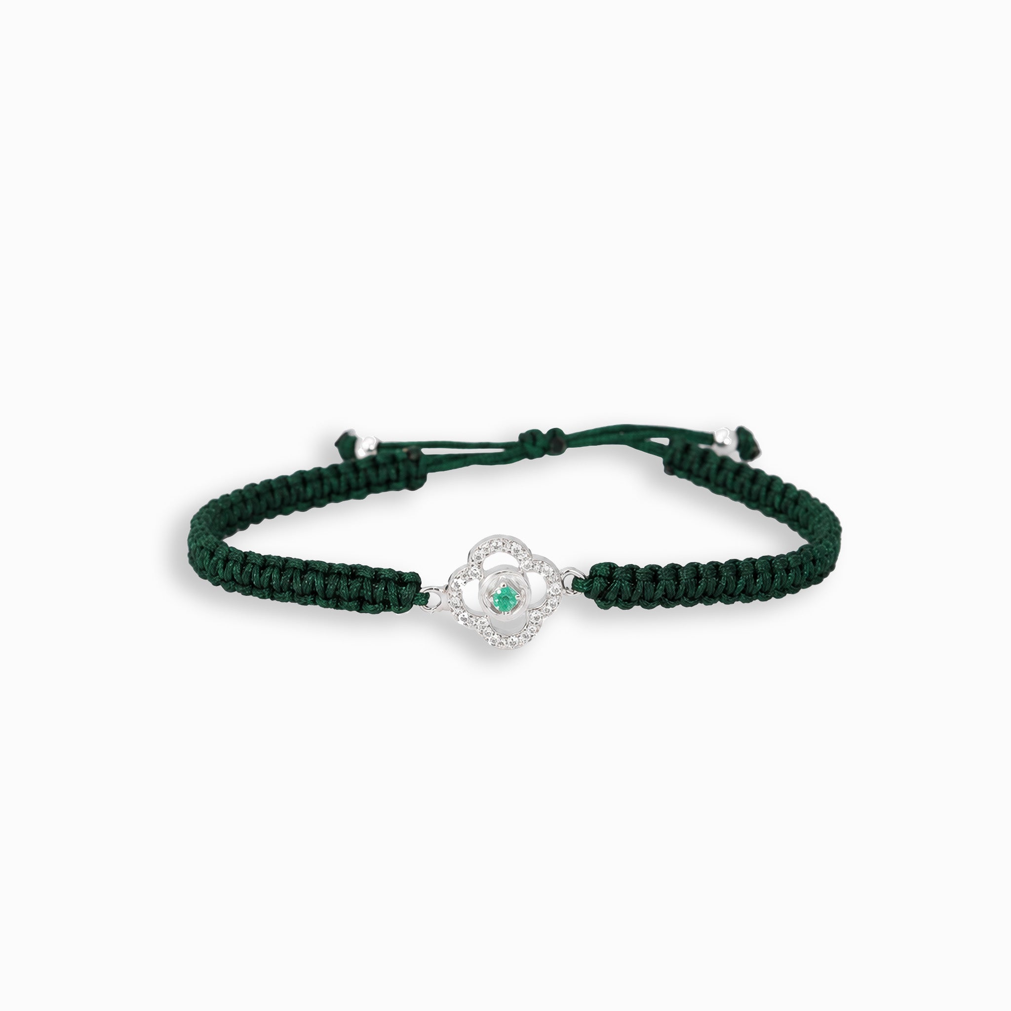 Pulsera tejida verde con dije de trébol en Plata Ley 925 y esmeralda central de Joyería Esterlina.