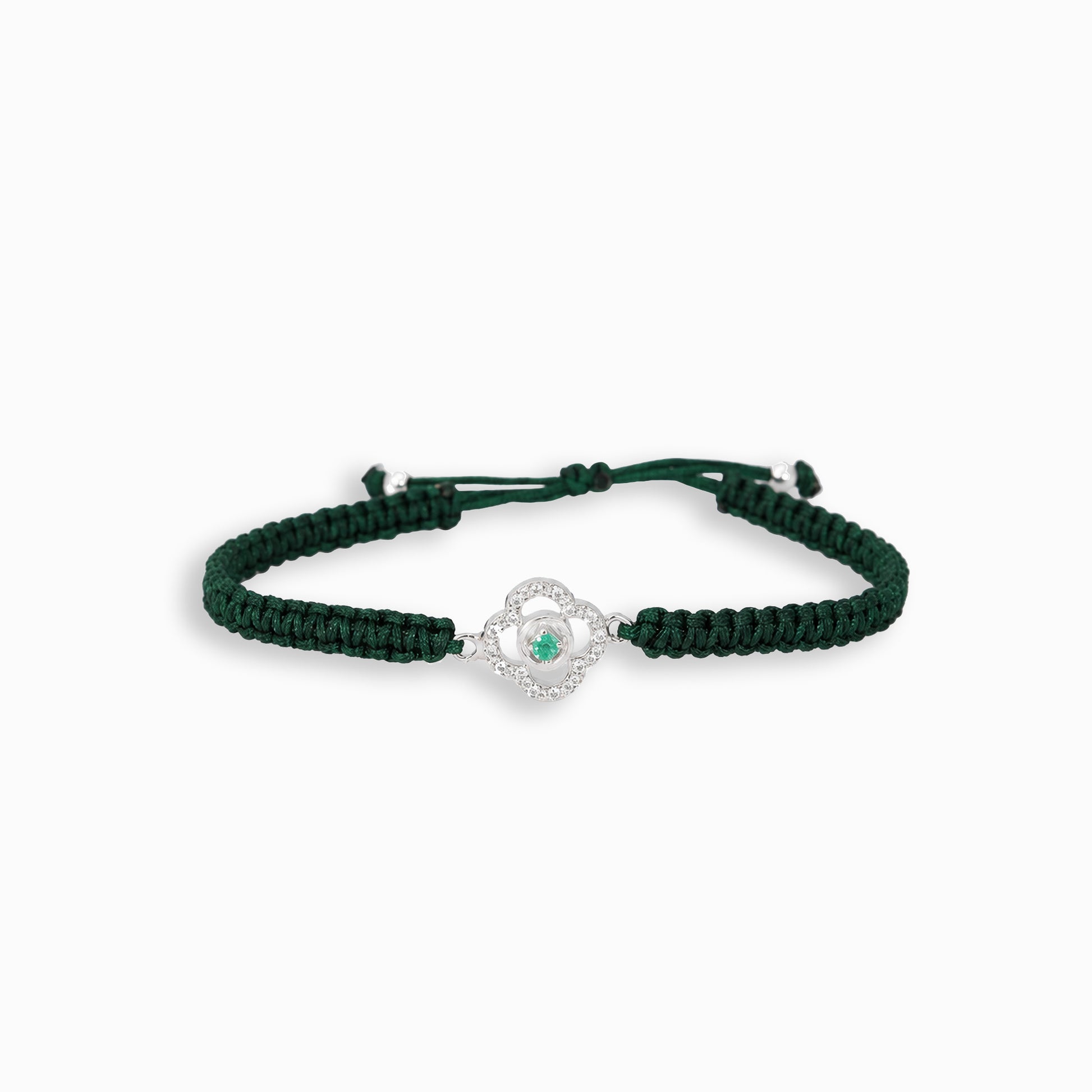 Pulsera tejida verde con dije de trébol en Plata Ley 925 y esmeralda central de Joyería Esterlina.