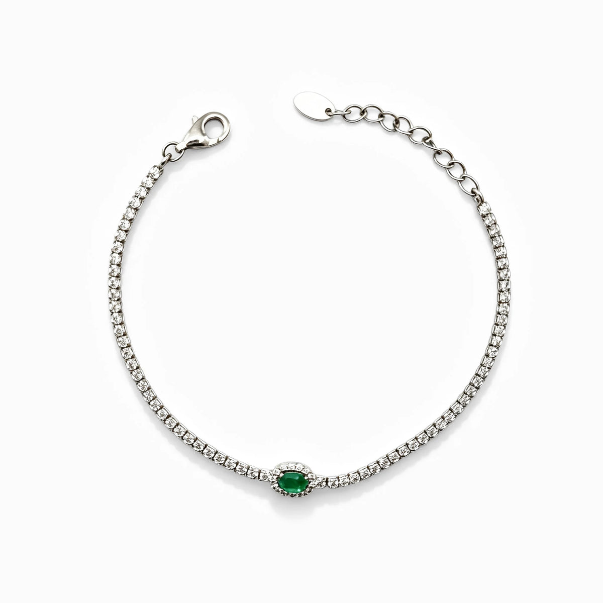 Pulsera tennis en plata ley 925 con esmeralda fina de 4.5x3 mm y circón verde central.