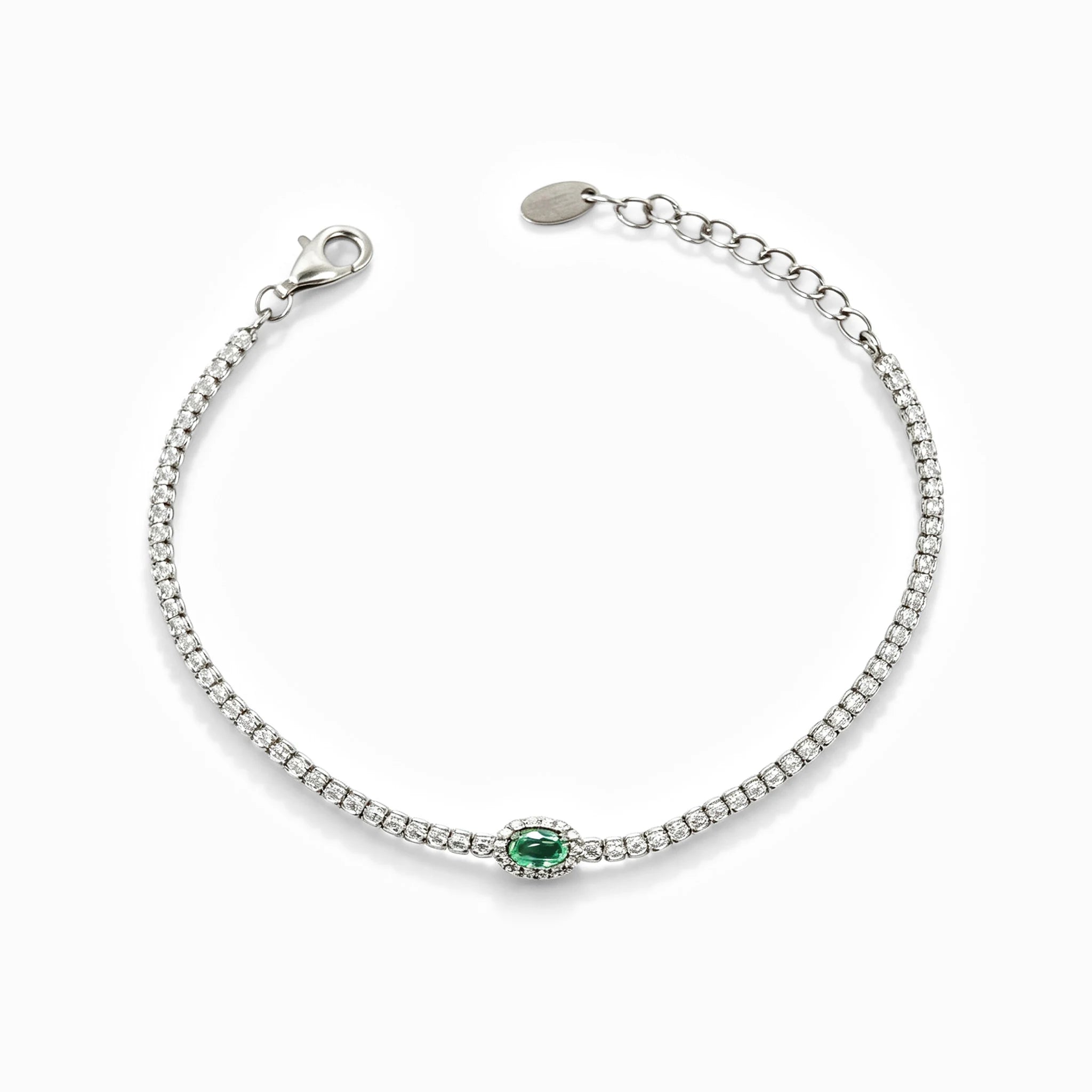 Pulsera tennis en plata ley 925 con esmeralda natural y halo de circones verdes y blancos.