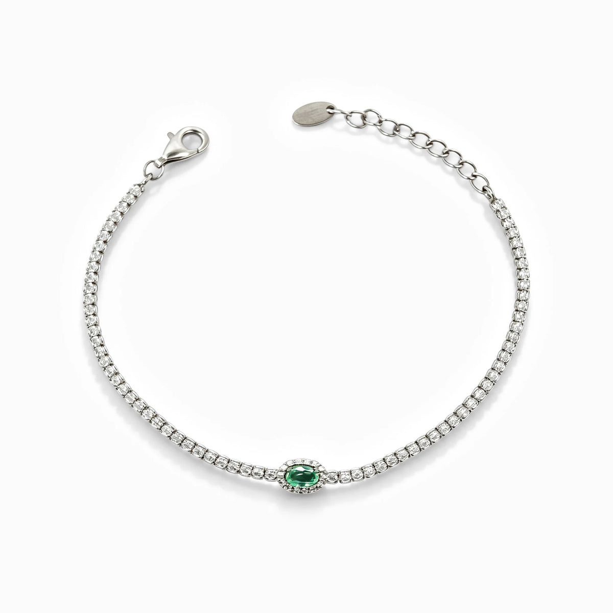 Pulsera tennis en plata ley 925 con esmeralda natural y halo de circones verdes y blancos.