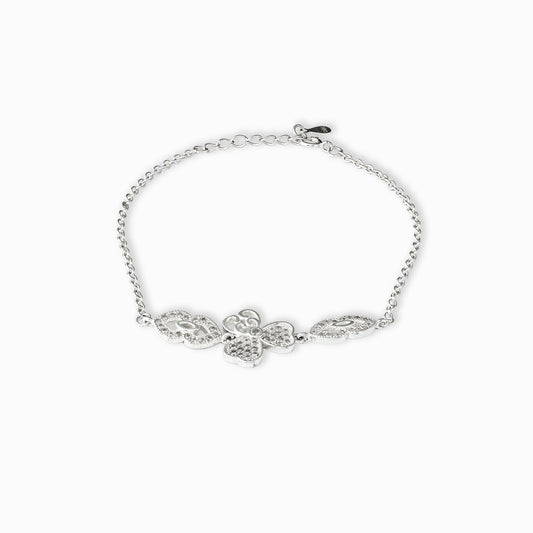Pulsera de plata ley 925 con dijes entrelazados de trébol de cuatro hojas y símbolo del infinito de 13 mm sobre fondo blanco.
