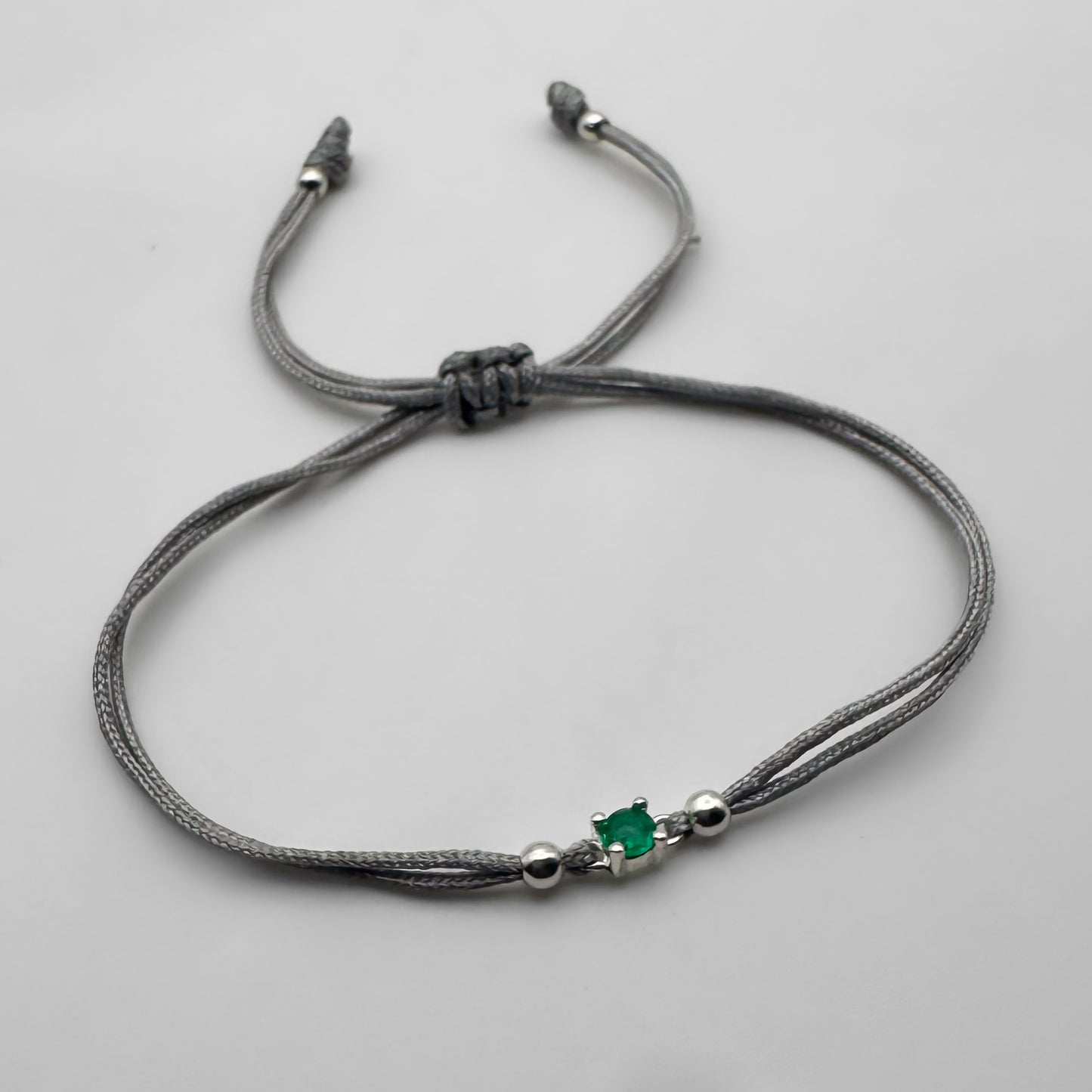 Pulsera tejida con Esmeralda