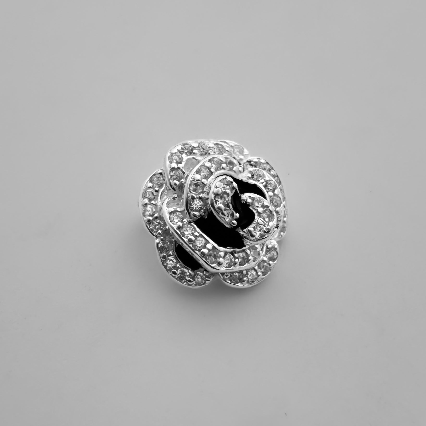 Dije Rosa flotante