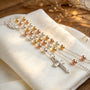 Rosario Trinita en plata ley 925 con balines de 3.9 mm en baño de oro amarillo y rosa.