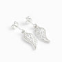 Set de aretes colgantes y dije en forma de ala celestial calada en plata ley 925 con circones.