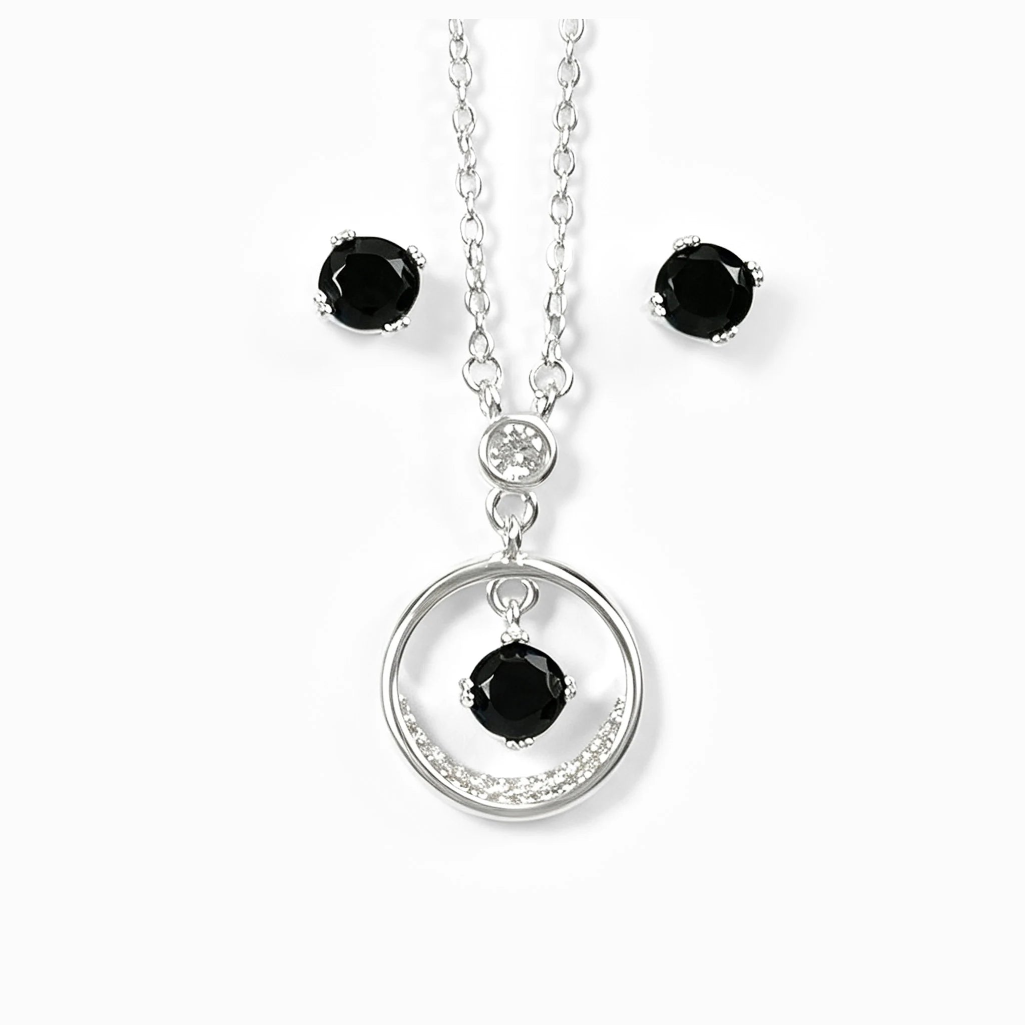 Set de topos y dije circular en plata ley 925 con circon negro central.