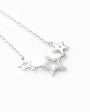 Set de topos y cadena con estrellas enlazadas en plata ley 925 engastadas con circones.
