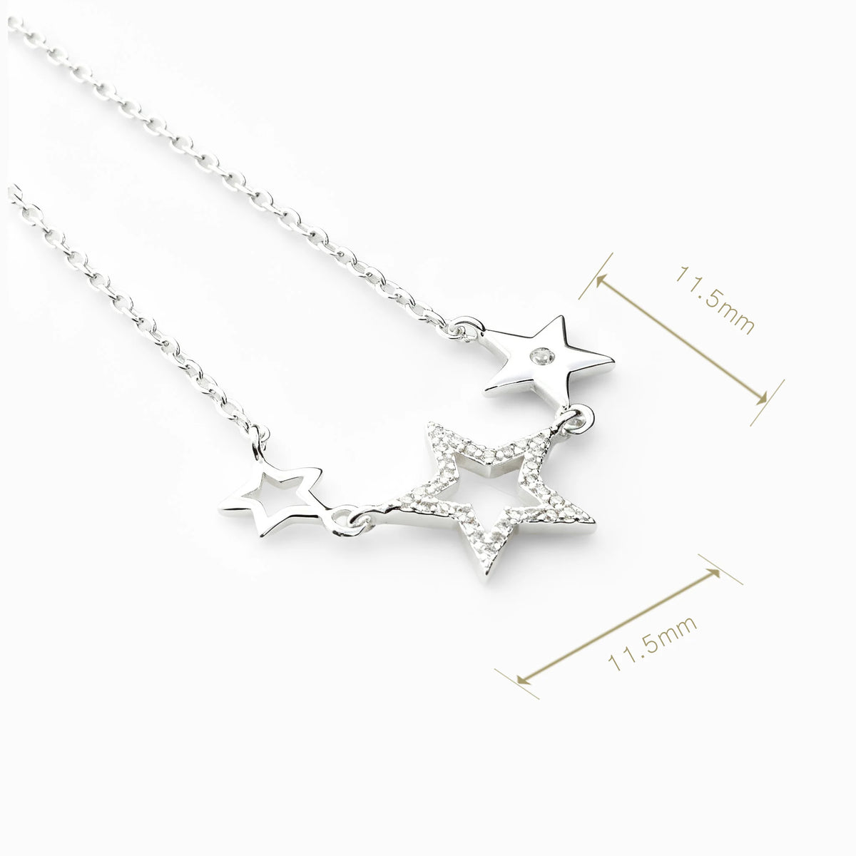 Set de topos y cadena con estrellas enlazadas en plata ley 925 engastadas con circones.