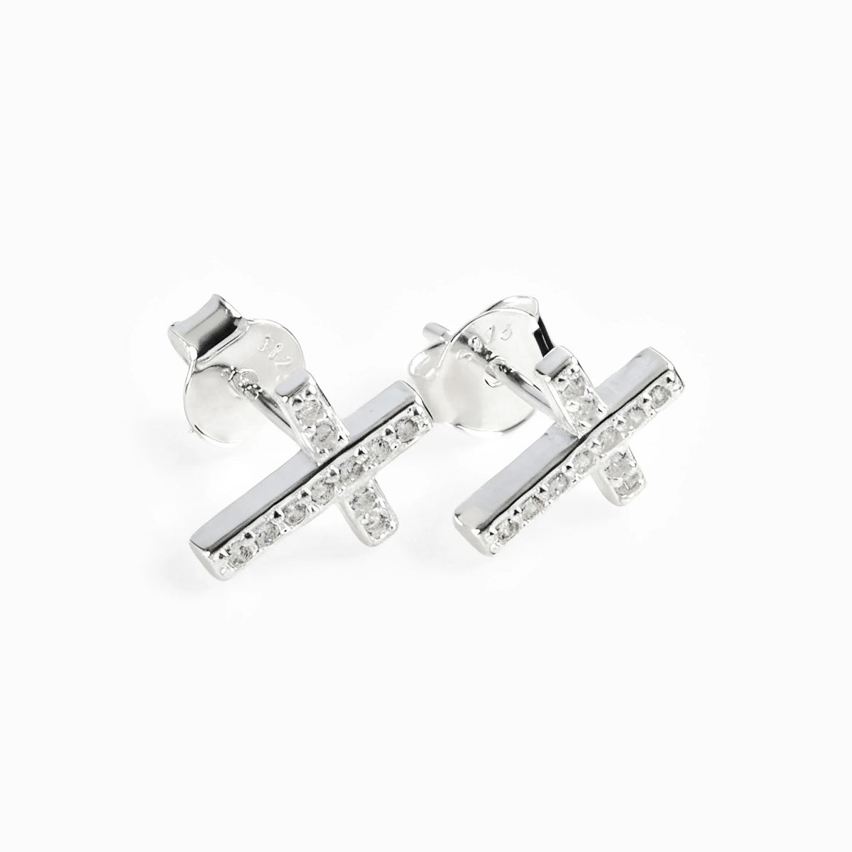 Set de topos y dije con diseño de cruz en plata ley 925 engastados con circones blancos