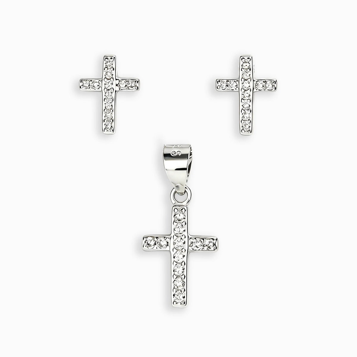 Set de topos y dije con diseño de cruz en plata ley 925 engastados con circones blancos