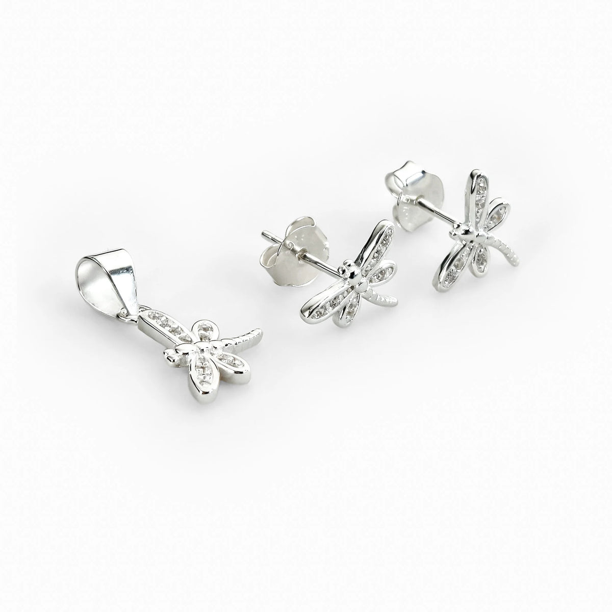 Set de topos y dije con diseño de libélula en plata ley 925 y circones blancos