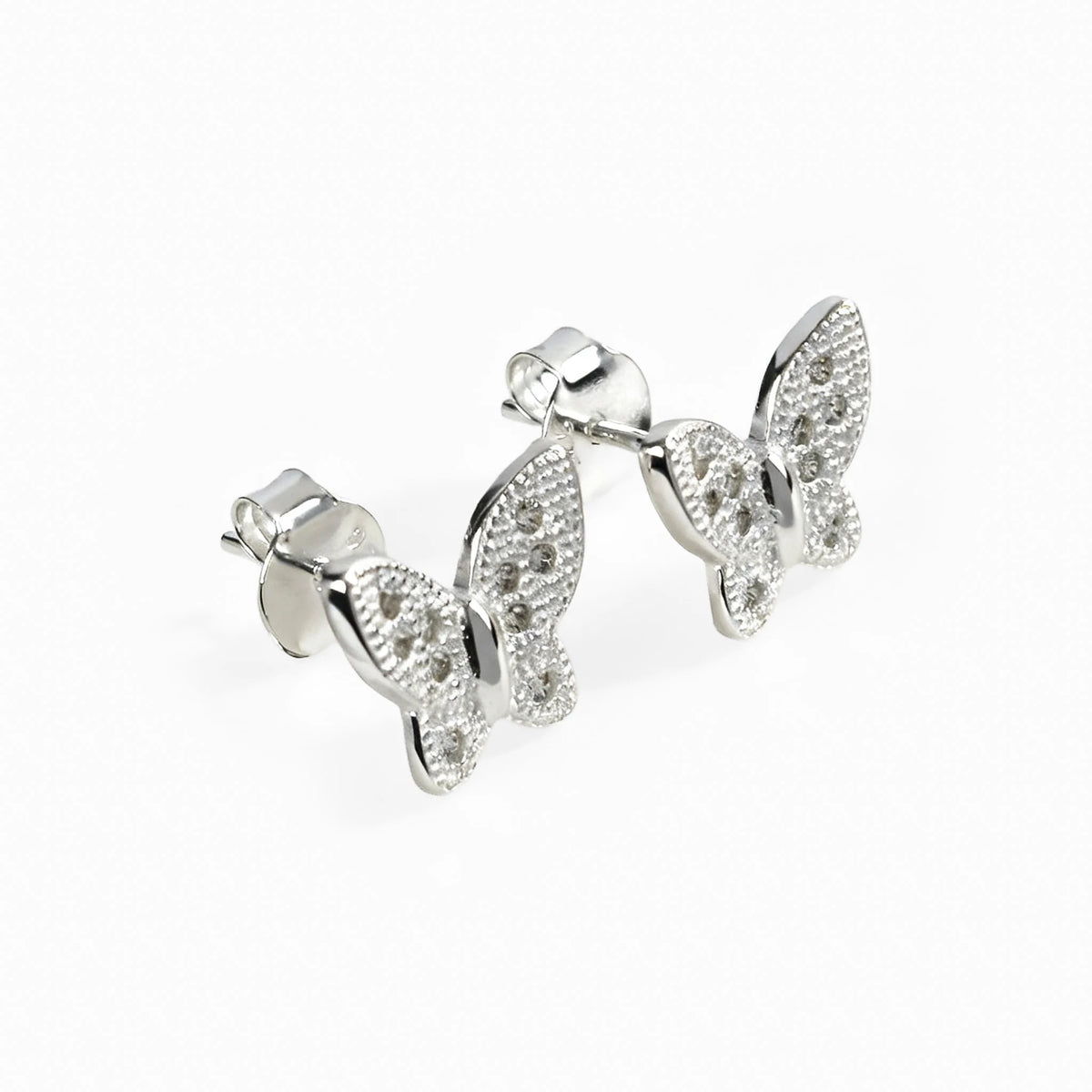 Set de topos y dije con forma de mariposa blanca en plata ley 925 y circones brillantes