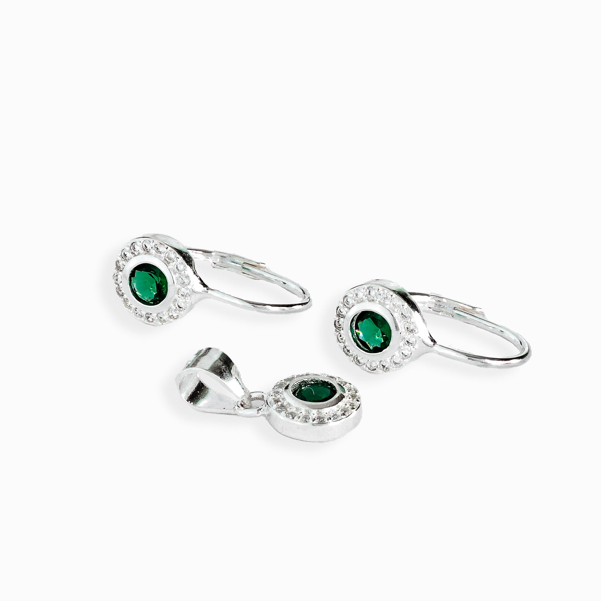 Set de aretes y dije diseño roseta en plata ley 925 y circon verde.