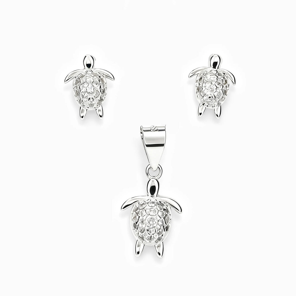 Set de topos y dije con diseño de tortuguita en plata ley 925 y circones blancos