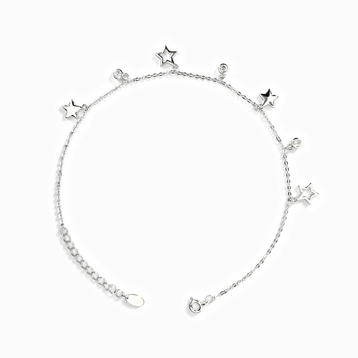 Tobillera en plata ley 925 de 1 mm con dijes de estrellas y circones blancos.