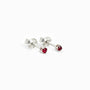 Topos mini botón en plata ley 925 con rubíes naturales rojos en engaste de cuatro garras.