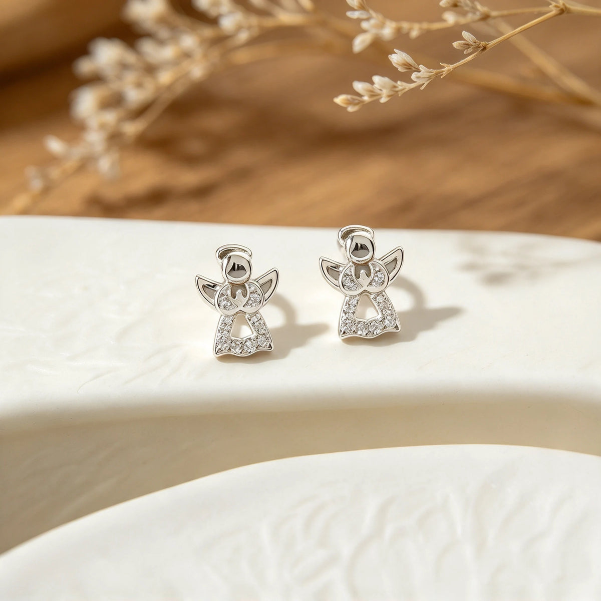 Topos miniatura con forma de ángel en plata ley 925 y circones de 8.8x7 mm