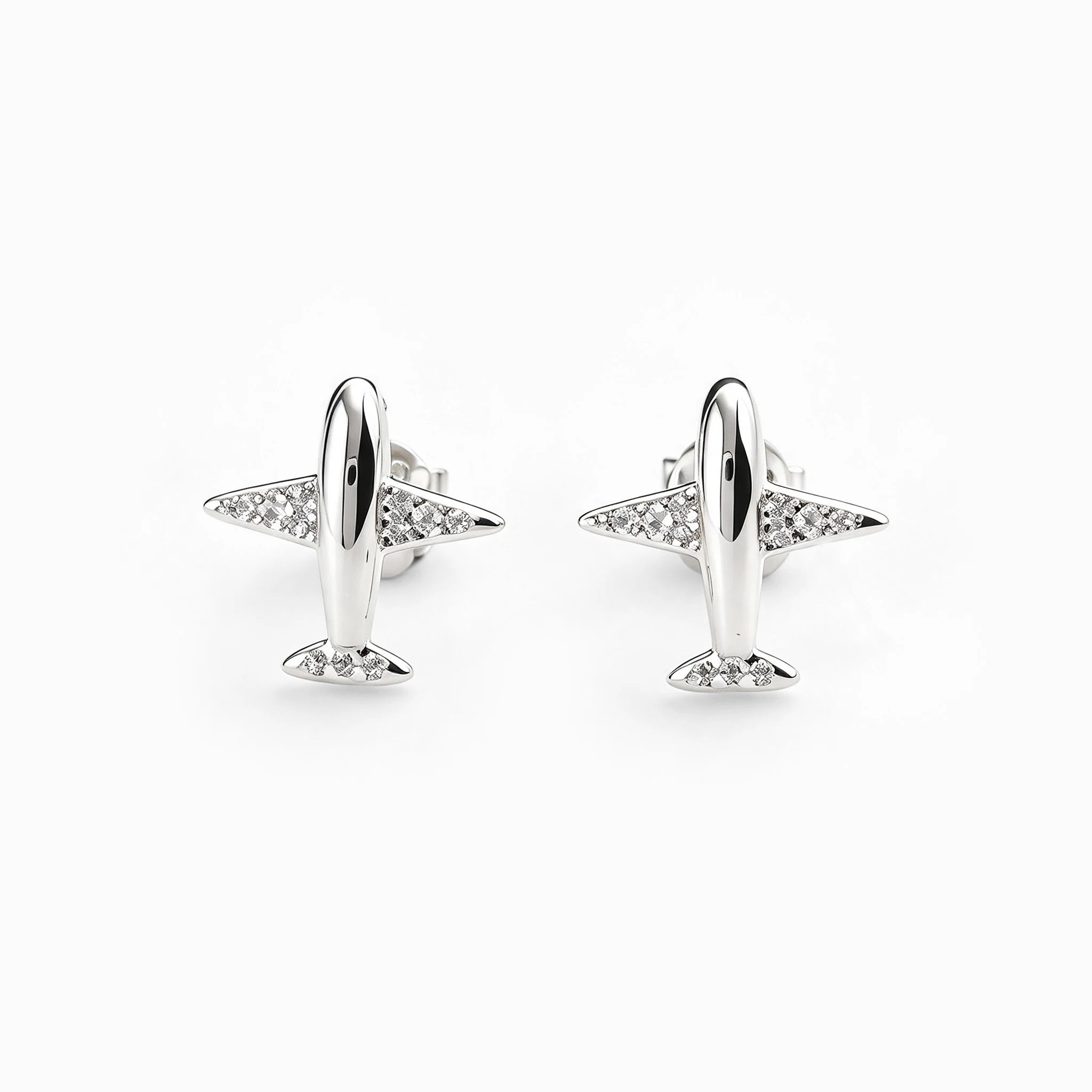 : Topos con diseño de avioncitos de 11x10 mm en plata ley 925 con circones