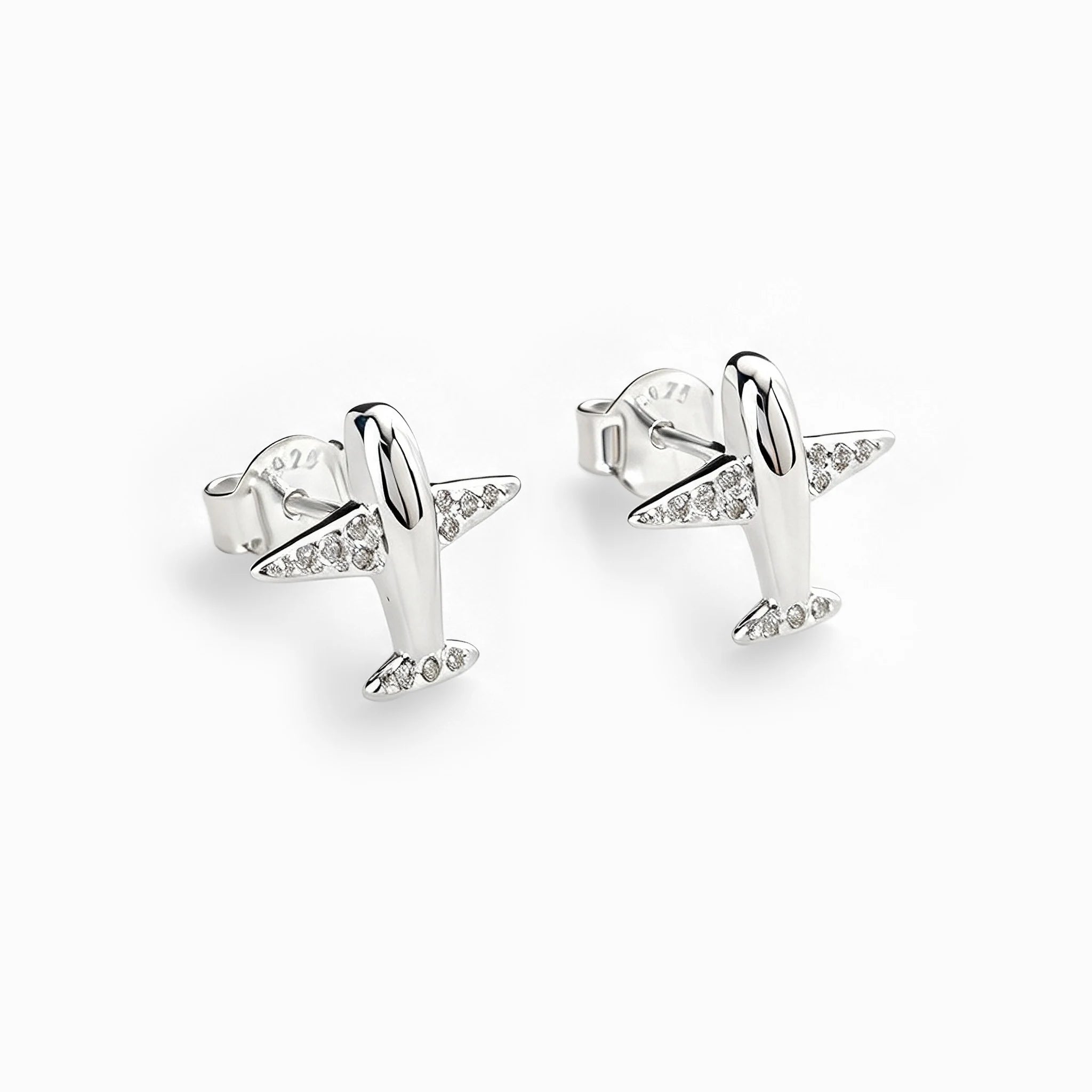 : Topos con diseño de avioncitos de 11x10 mm en plata ley 925 con circones