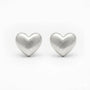 Topos en forma de corazón con acabado satinado en plata ley 925.