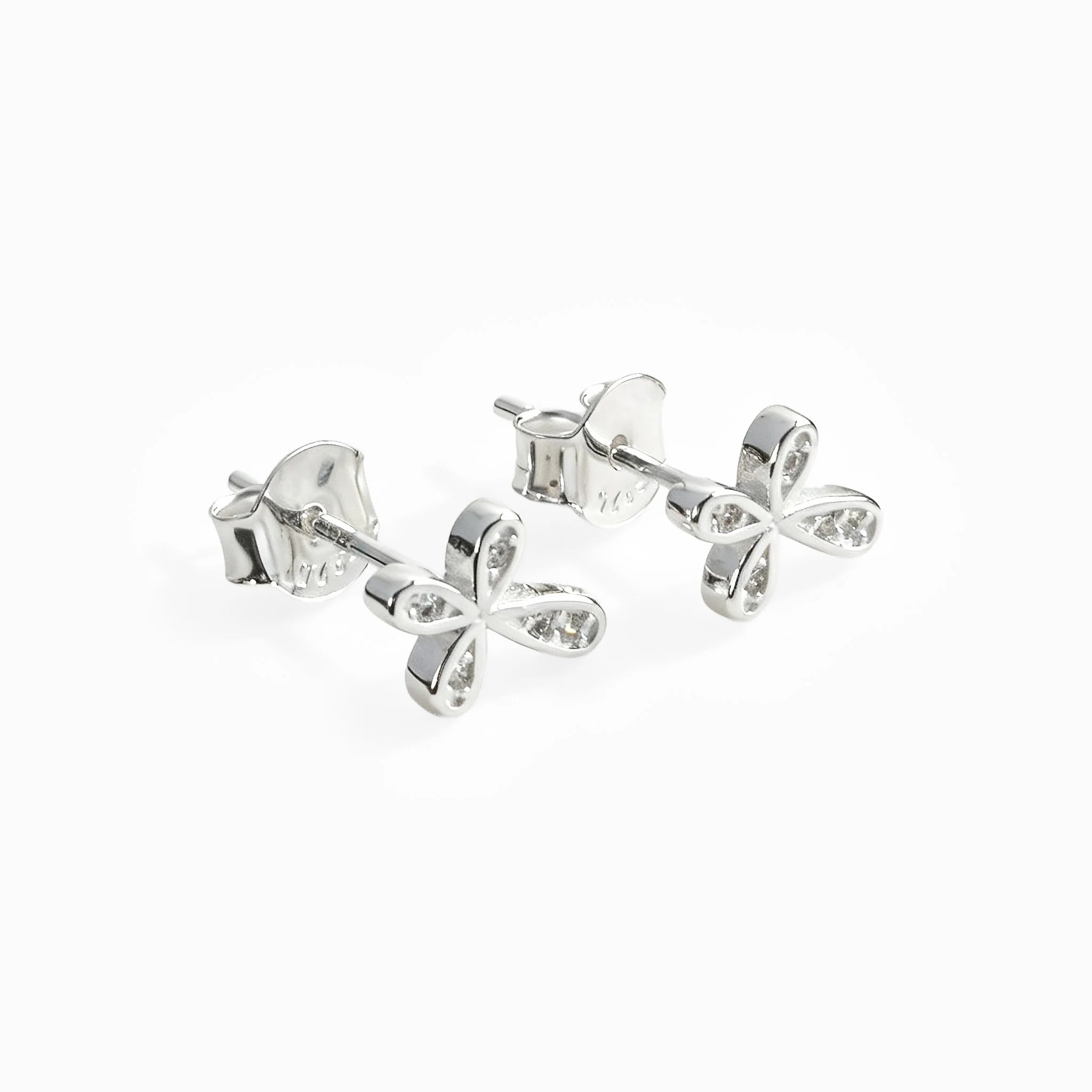Topos con diseño de cruz mini de 8.5x6.7 mm en plata ley 925 con circones blancos