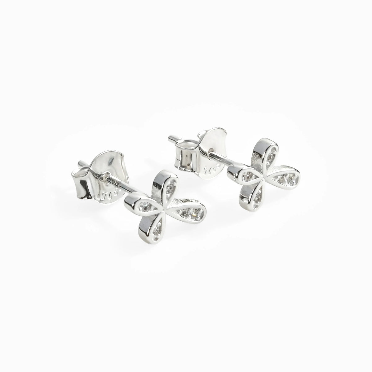 Topos con diseño de cruz mini de 8.5x6.7 mm en plata ley 925 con circones blancos
