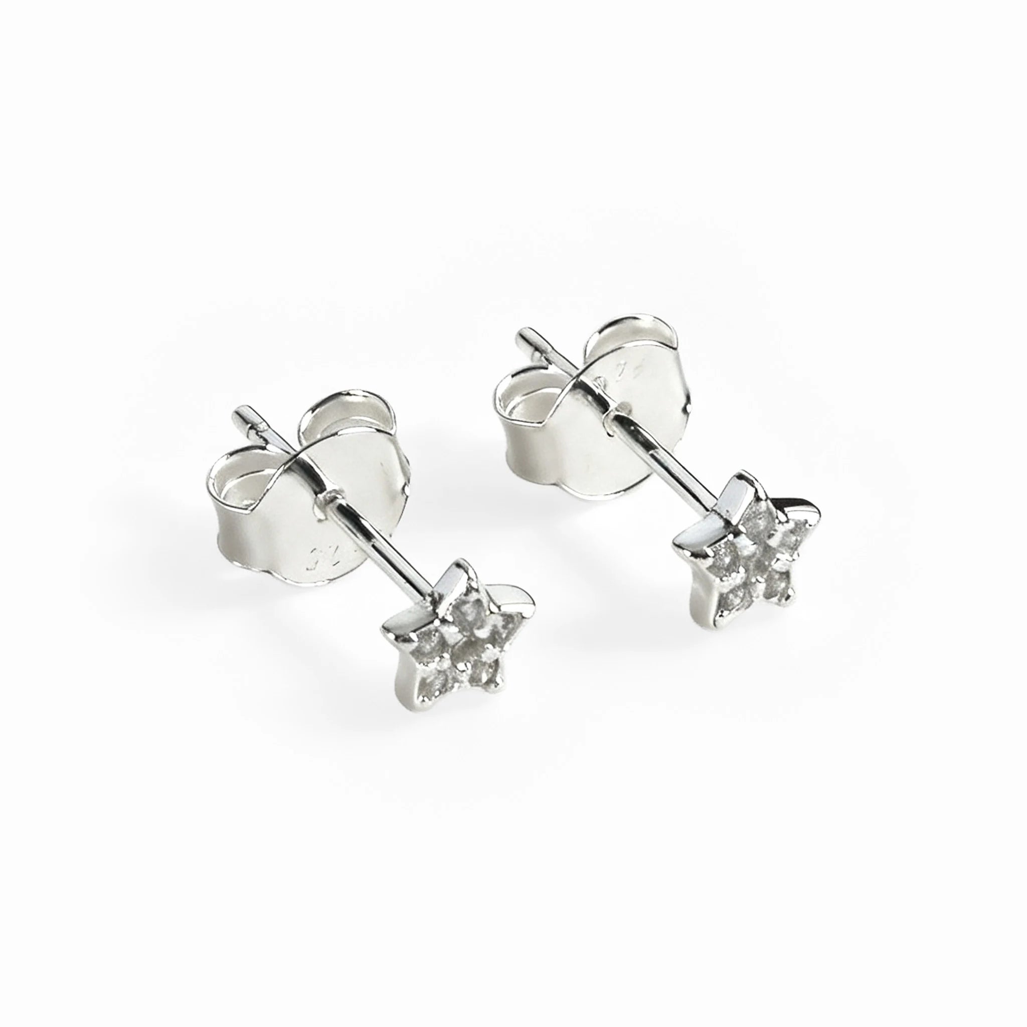 Topos en forma de estrella mini de 4.4x4.4 mm en plata ley 925 con circones