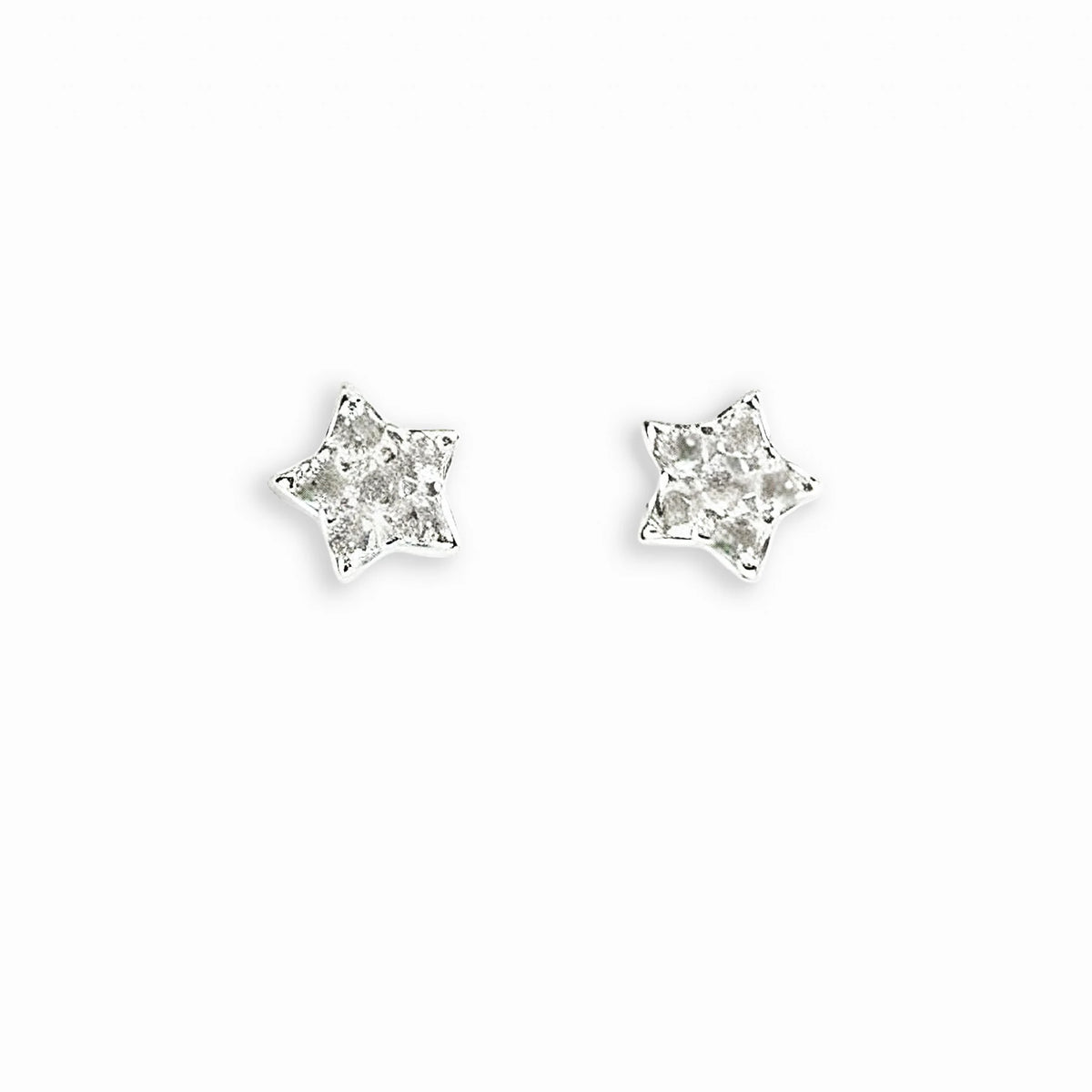 Topos en forma de estrella mini de 4.4x4.4 mm en plata ley 925 con circones