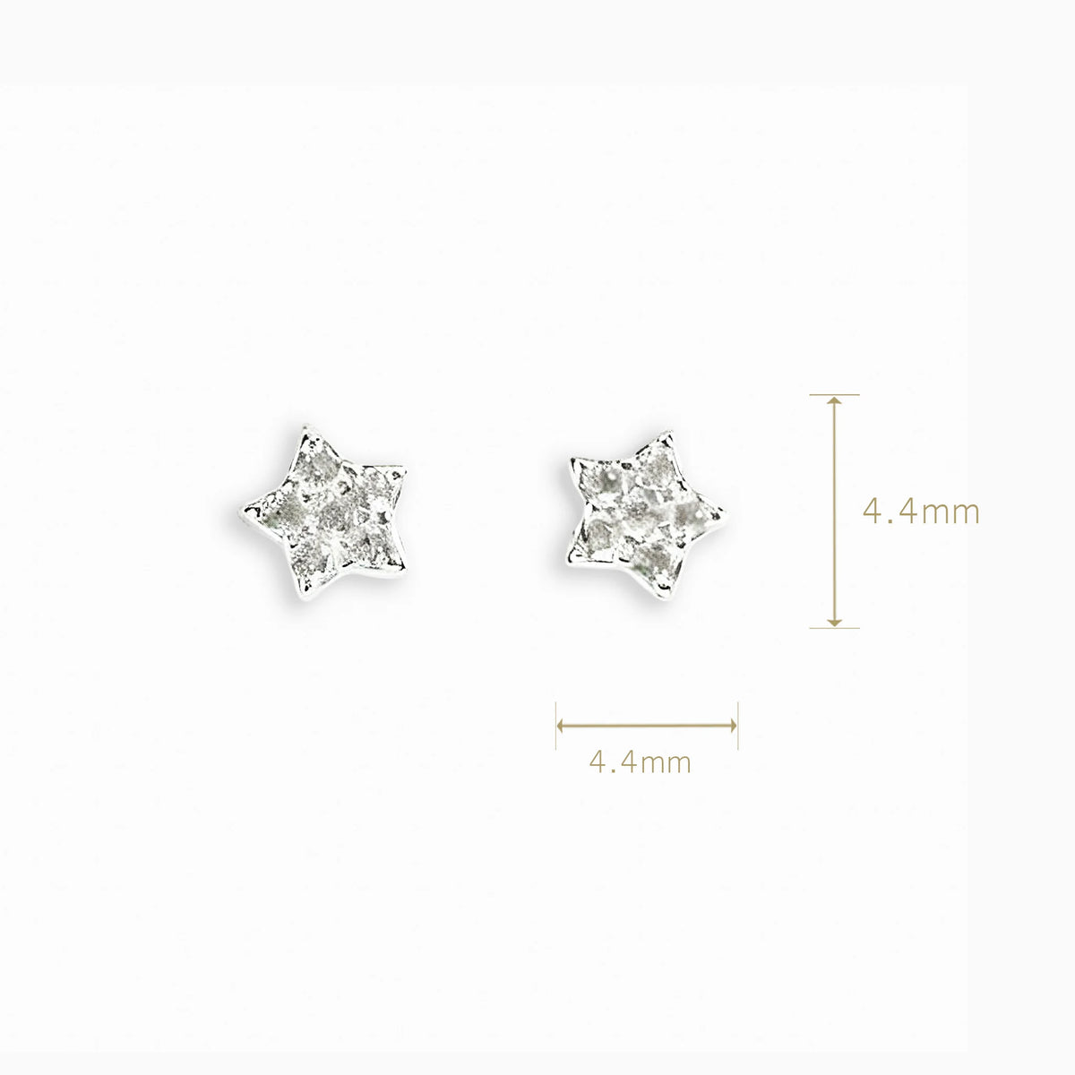 Topos en forma de estrella mini de 4.4x4.4 mm en plata ley 925 con circones