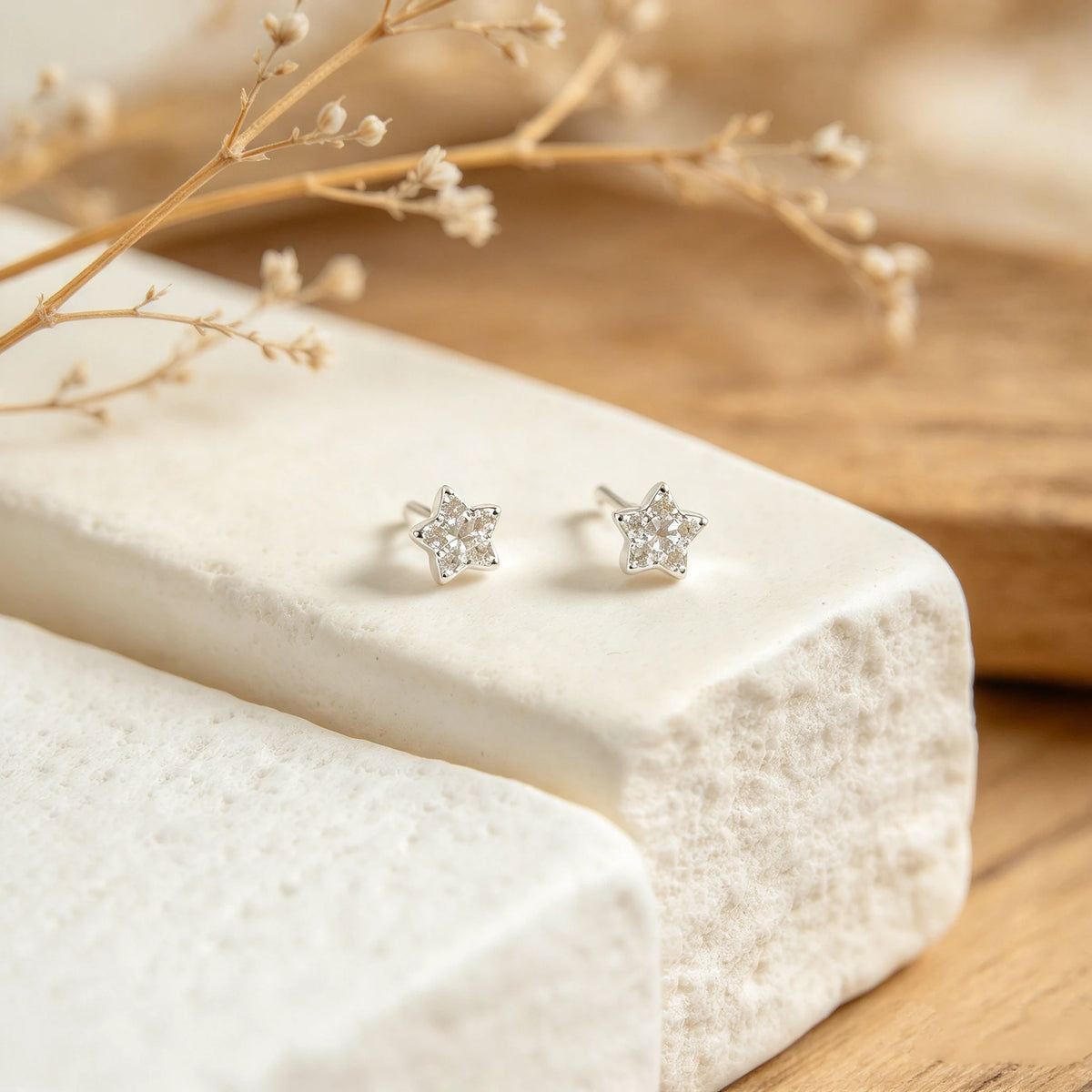 Topos en forma de estrella mini de 4.4x4.4 mm en plata ley 925 con circones