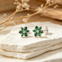 Topos florales de 8 mm en plata ley 925 con circones verdes y circon blanco centra