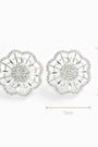 Topos floral texturizado con circones en plata ley 925 para mujer