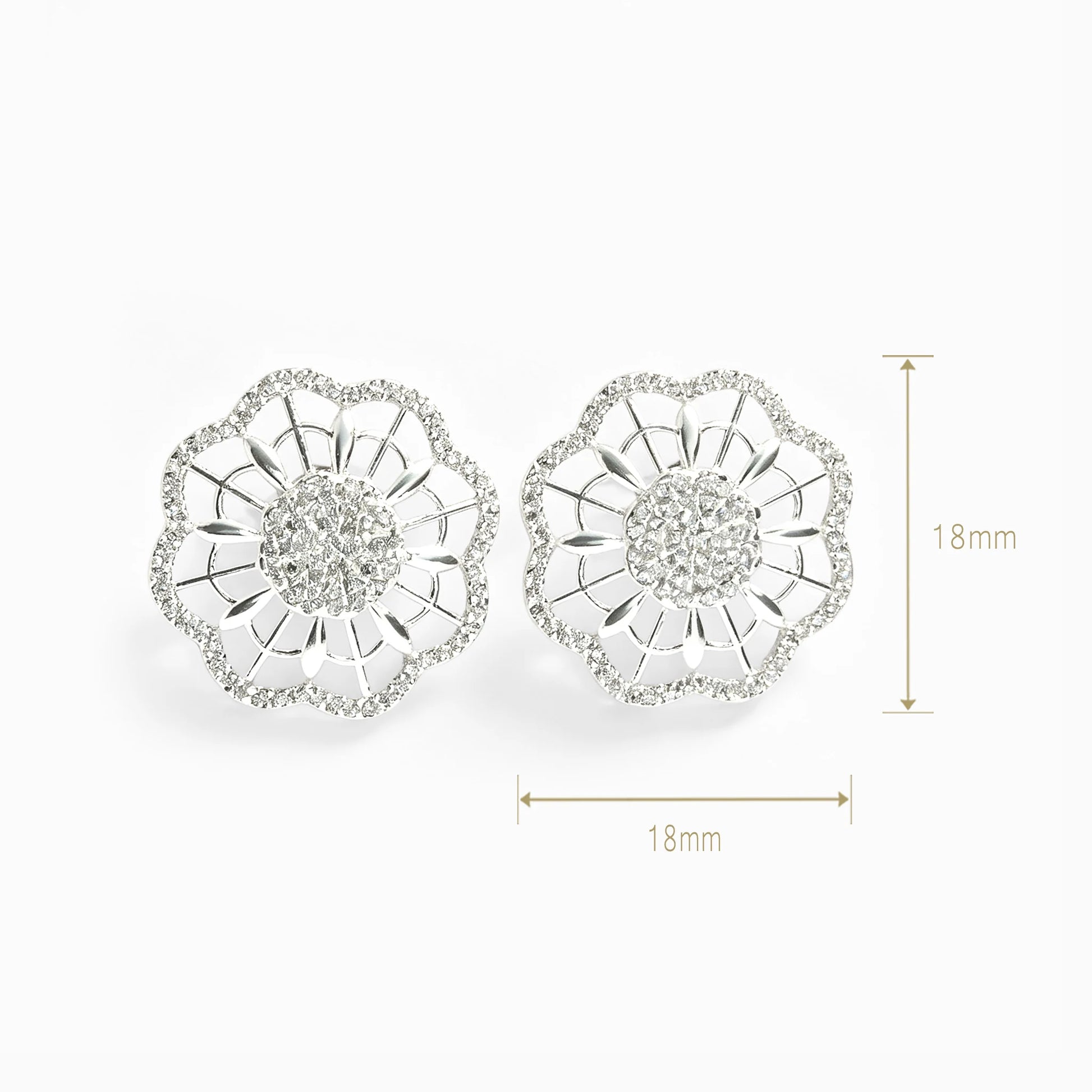 Topos floral texturizado con circones en plata ley 925 para mujer