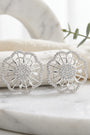 Topos floral texturizado con circones en plata ley 925 para mujer