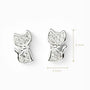 Topos con silueta de gato de 9.4x5.5 mm en plata ley 925 engastados con circones.