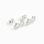 Topos con el símbolo de infinito de 10x5.2 mm en plata ley 925 con circones blancos.