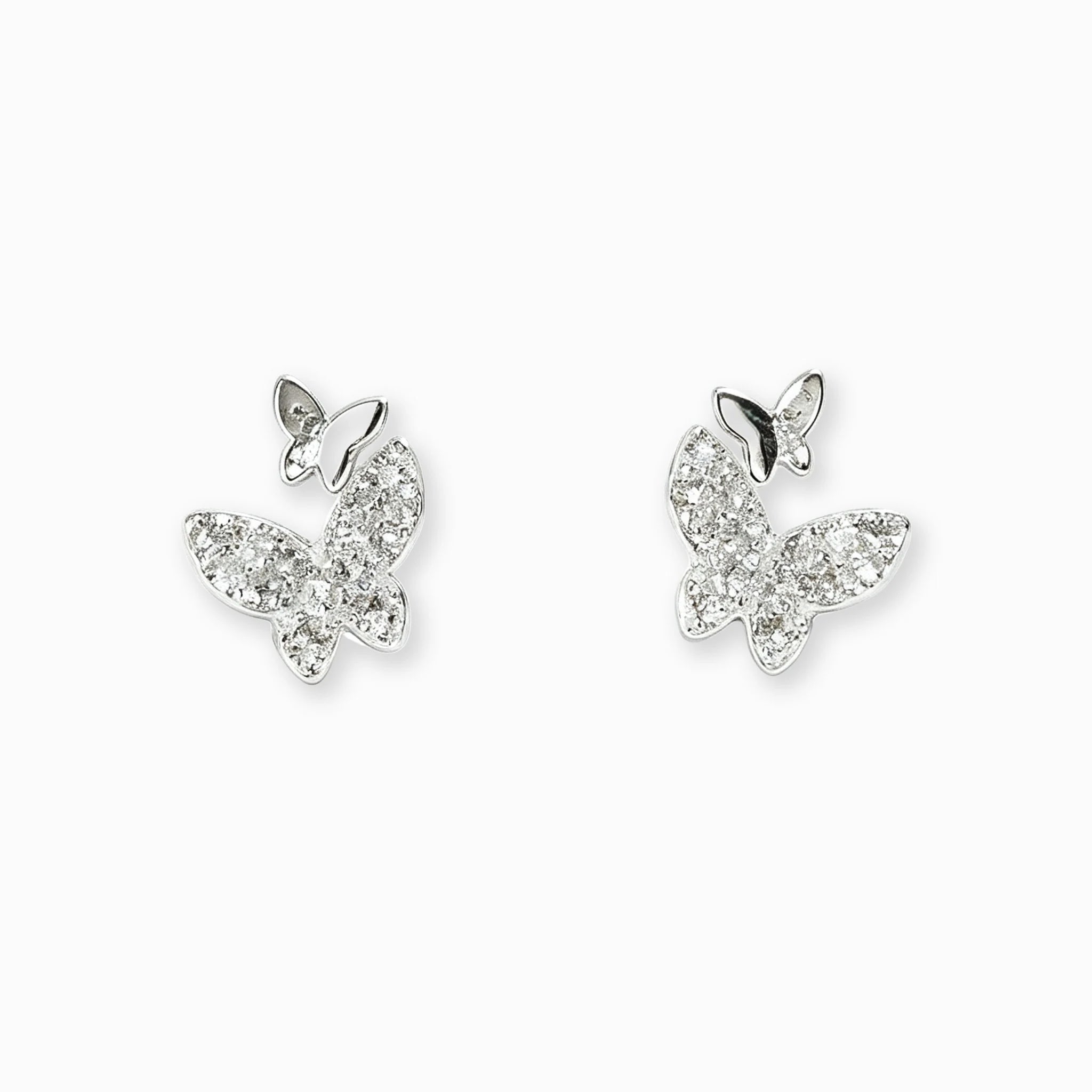 Topos con diseño asimétrico de mariposas de 8x7 mm en plata ley 925 con circones blancos