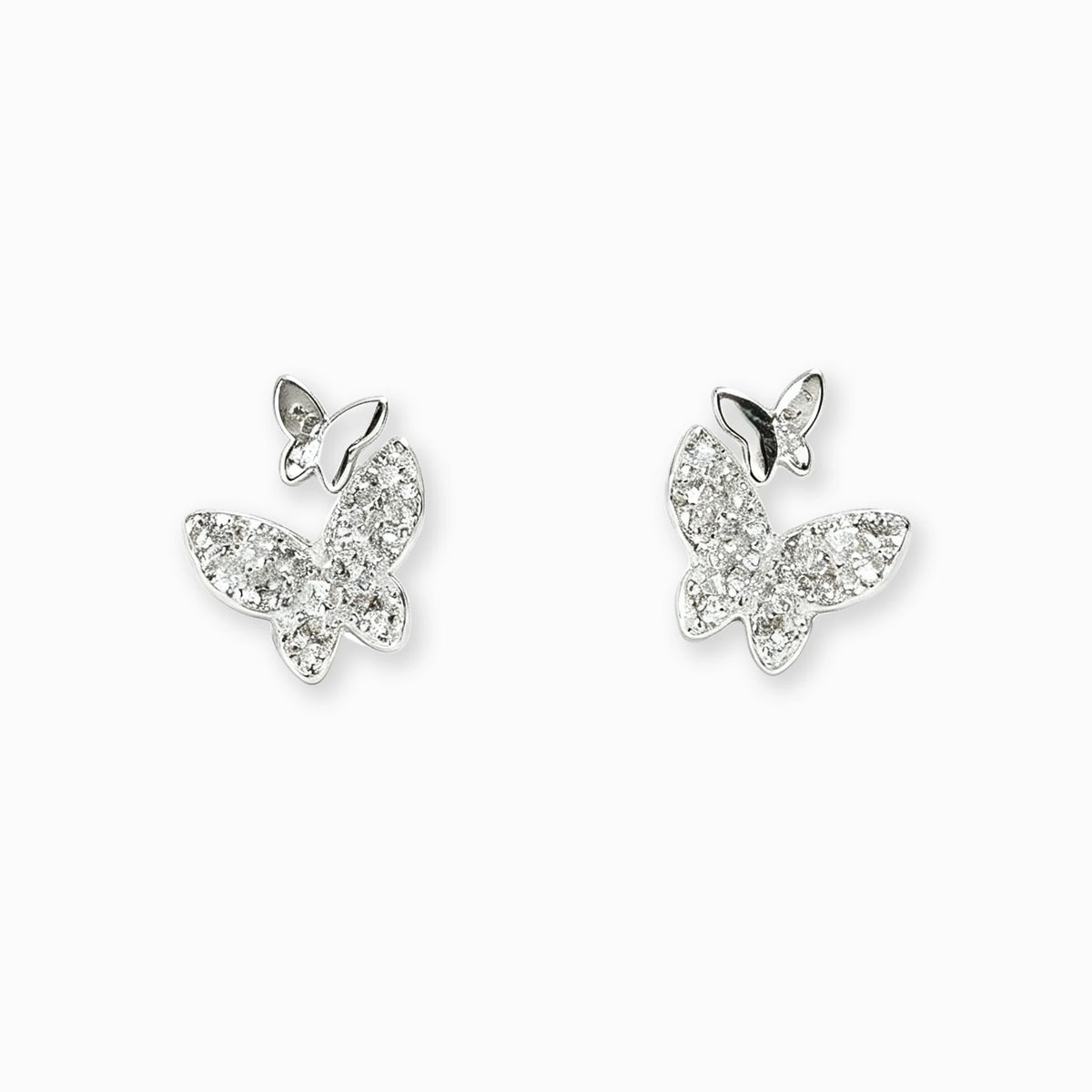 Topos con diseño asimétrico de mariposas de 8x7 mm en plata ley 925 con circones blancos