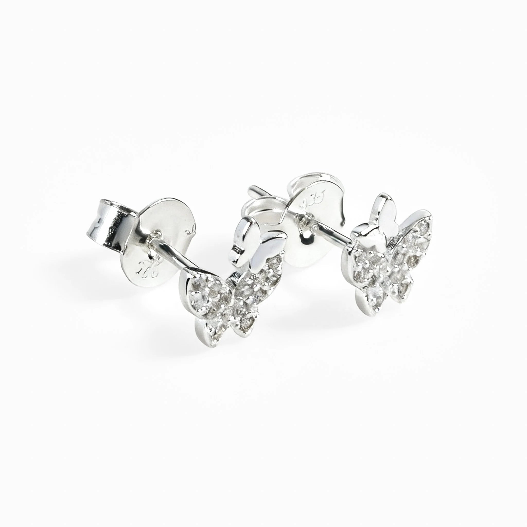 Topos con diseño asimétrico de mariposas de 8x7 mm en plata ley 925 con circones blancos