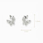 Topos con diseño asimétrico de mariposas de 8x7 mm en plata ley 925 con circones blancos