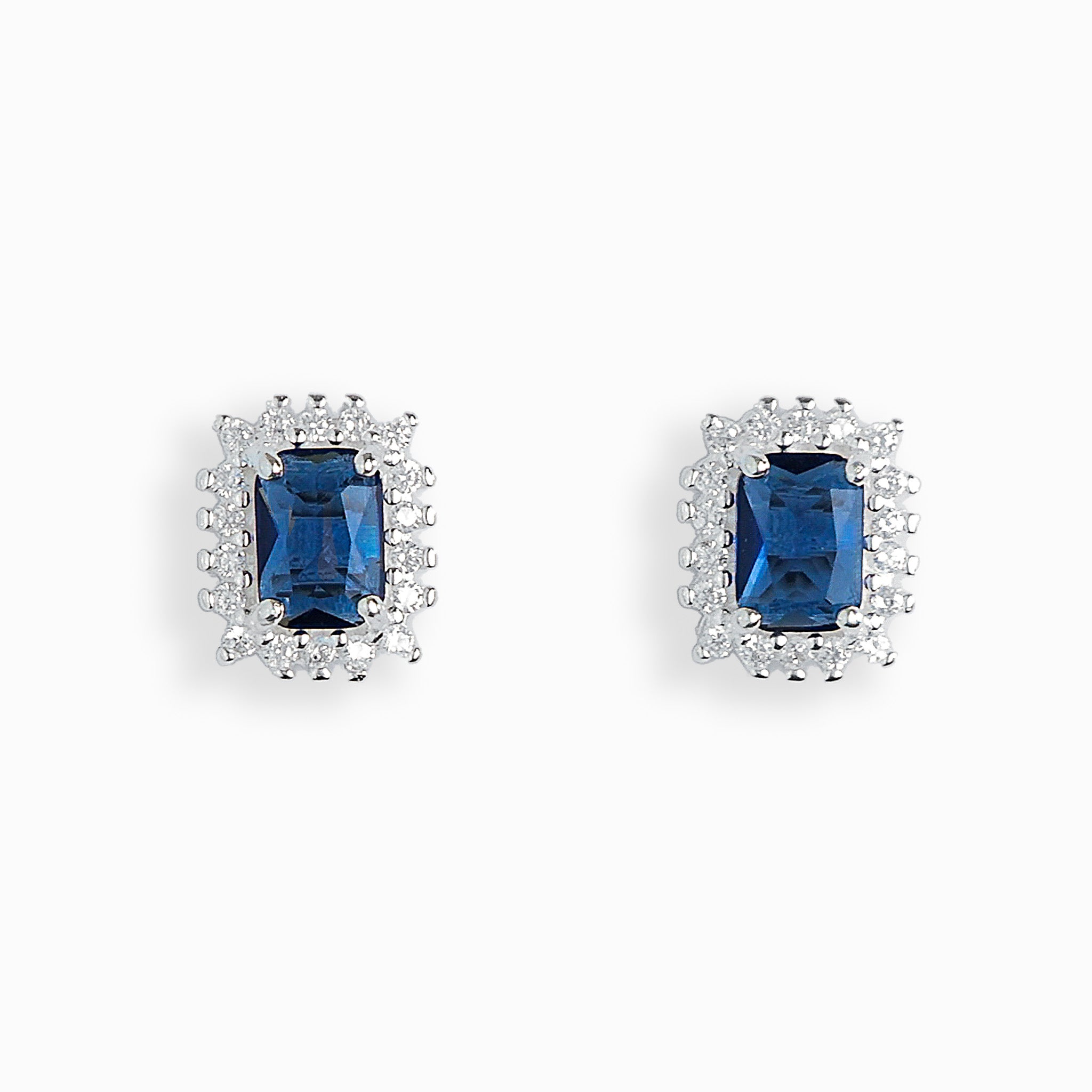 Topos rectangulares en plata ley 925 con circon azul.