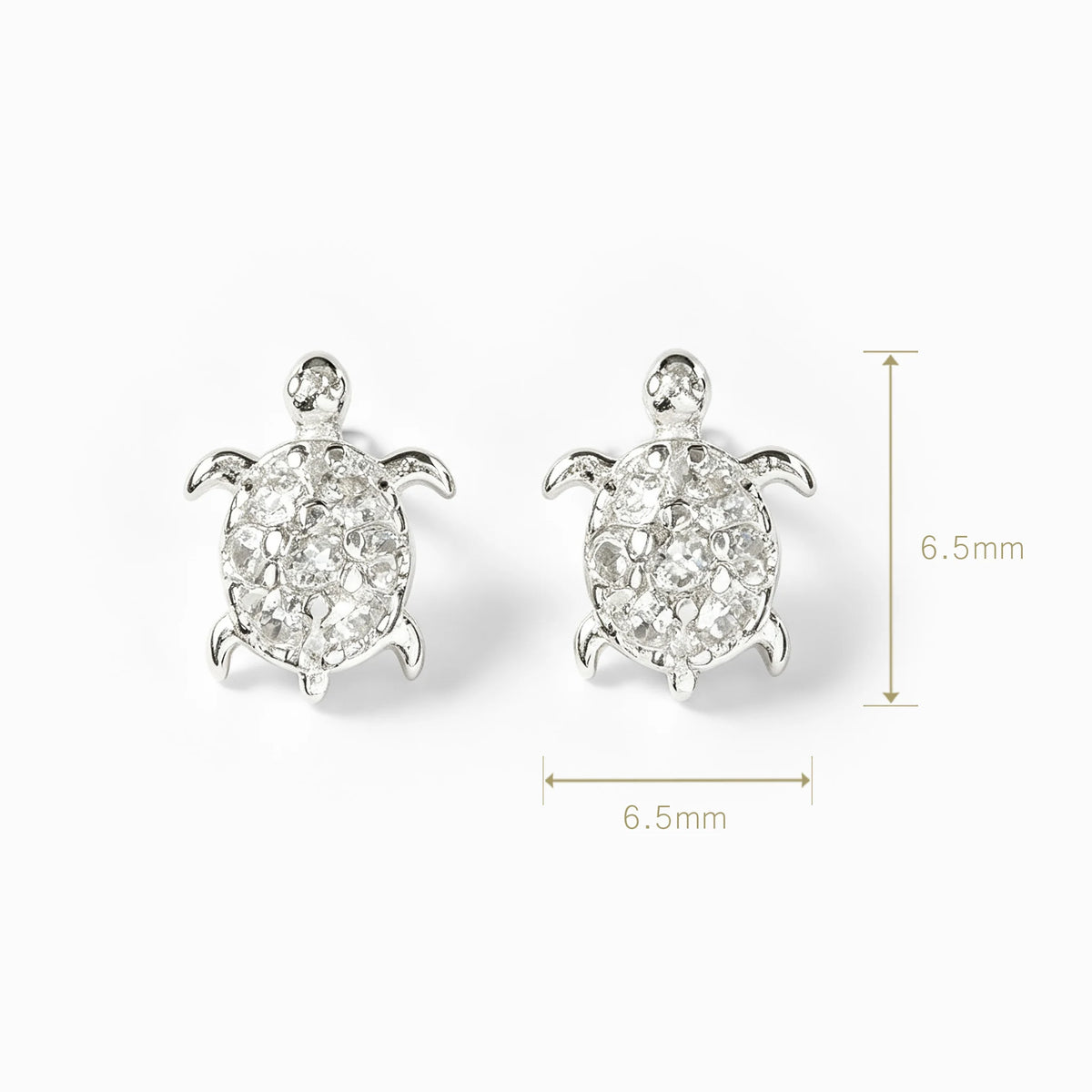 Topos con forma de tortuguita en plata ley 925 de 6x5 mm con circones blancos